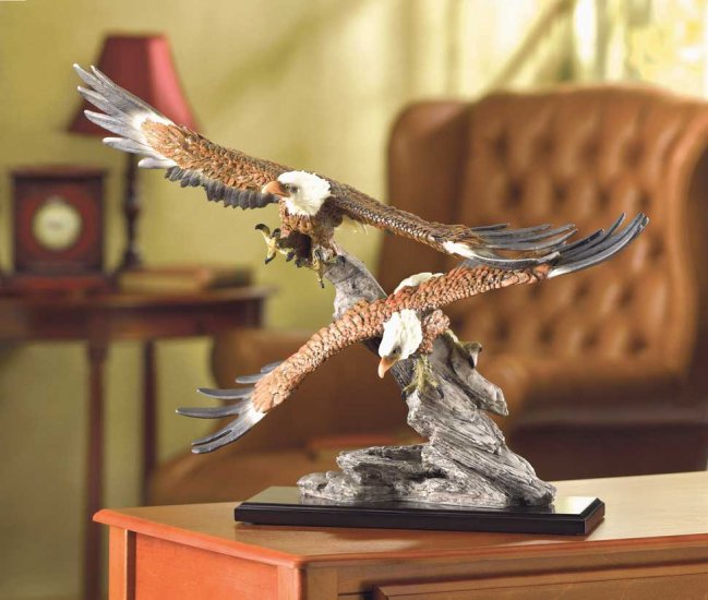 EAGLES SOAR OVER ROCKS