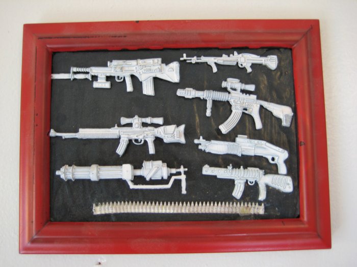 little white guns on black and red