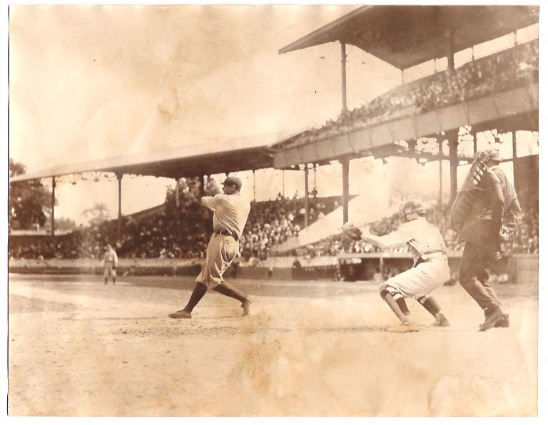 Real Photo of Babe Ruth at bat with Garret catching 1920