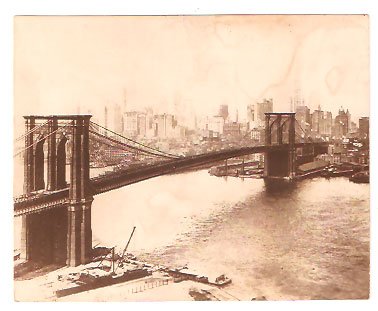 Real Photo of the Brooklyn Bridge across the East River w/view of Manhattan skyline, 1915
