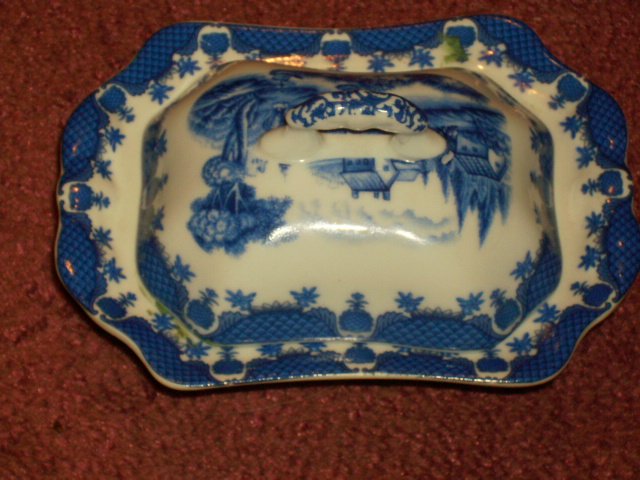 blue and white butter server