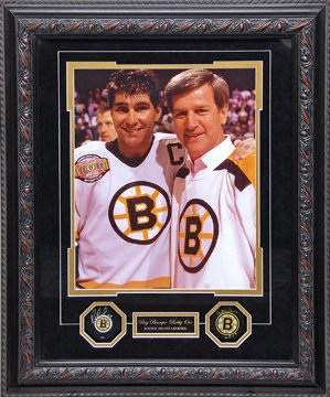 BOBBY ORR - RAY BOURQUE AUTOGRAPHED PUCKS IN SHADOWBOX