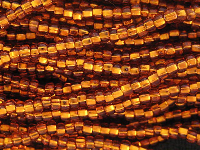 11/0 CZECH GLASS SEED BEADS SILVER LINED DARK TOPAZ 1 HANK
