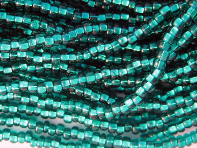 11/0 CZECH GLASS SEED BEADS SILVER LINED EMERALD 1 HANK