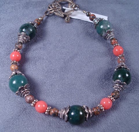 Coral Bracelet with bali style bead caps