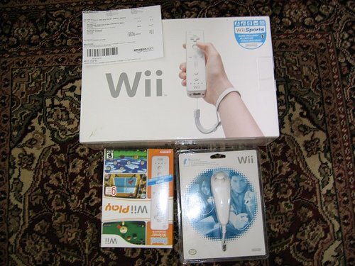 NIntendo Wii w/14 Games + 4 Remotes