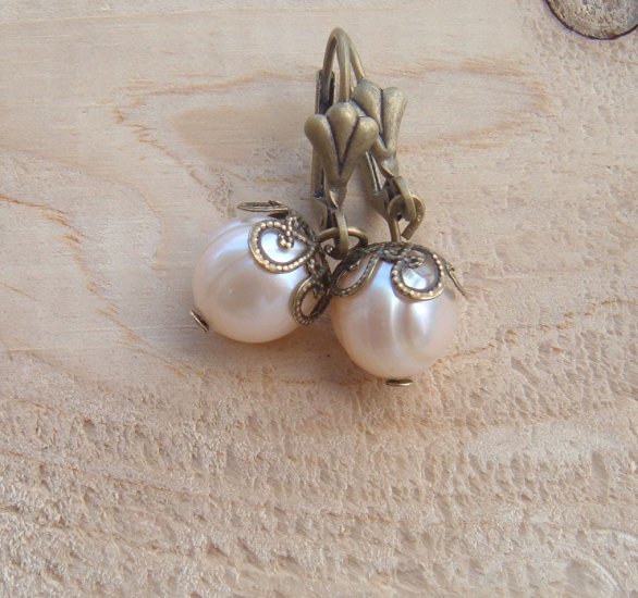 Peach pearls in my ears