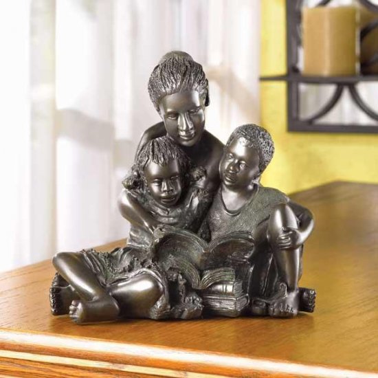 A MOTHER TEACHES STATUETTE
