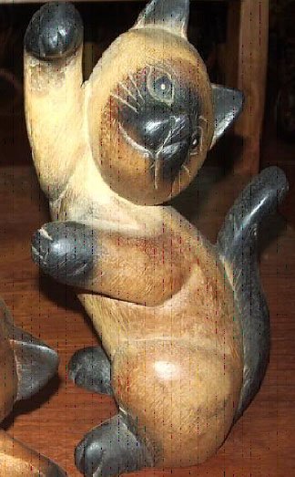 Wooden cat (price in euro)