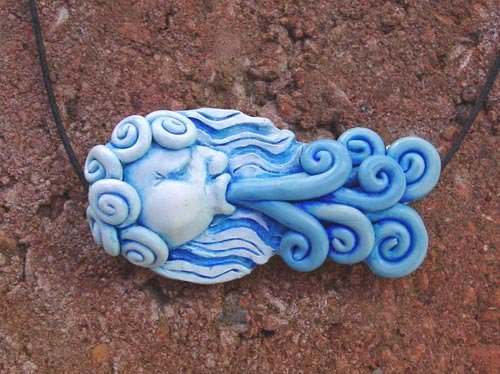 Wind polymer clay focal bead