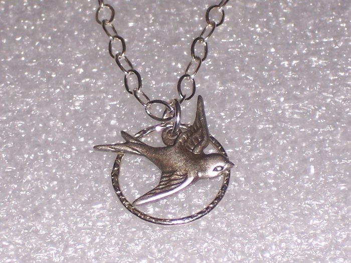 Sparrow Bird Necklace over a Sterling Hammered Circle and Sterling silver Chain