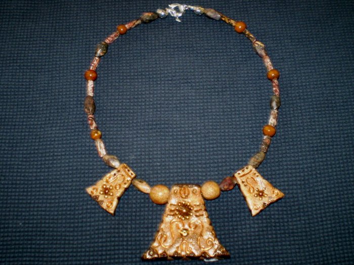 Unique Handcrafted Pendants surrounded by Leopard Skin and Caramel Jasper