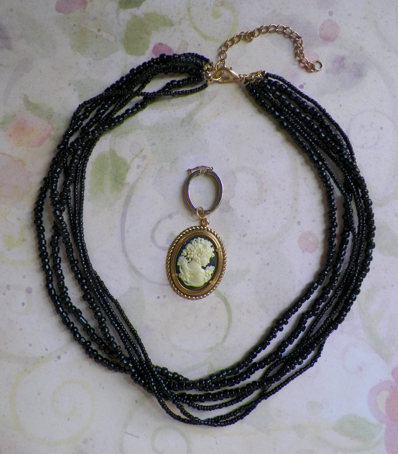 Multi-Strand Black Seed Bead Necklace with Cameo Enhancer