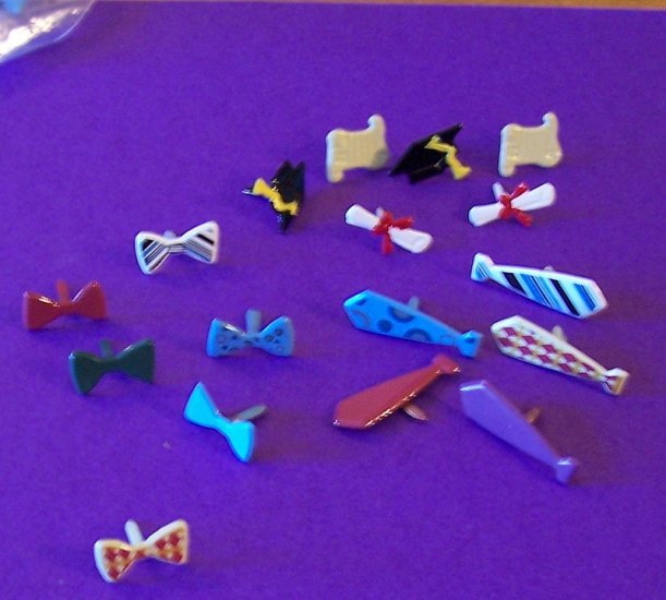 Lot of 17 brads in 3 designs and variety of colors for scrapbooks