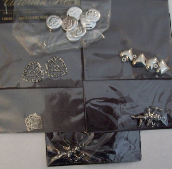 Lot of silver heart coin cupid charms MIP