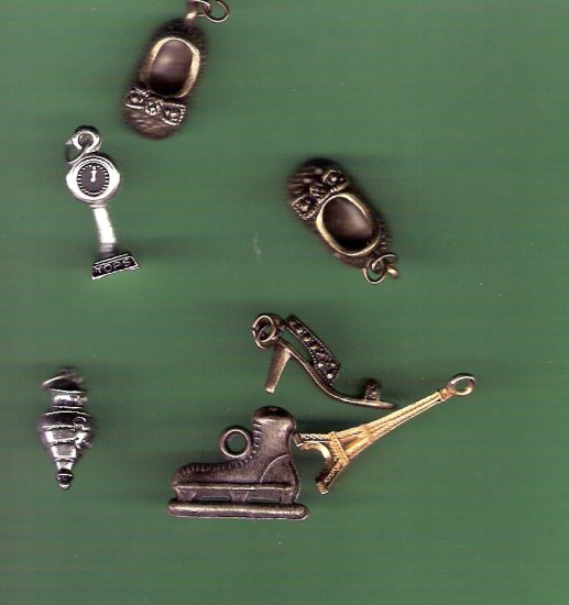 Mixed lot of charms shoes skates scales toy Eiffel Tower