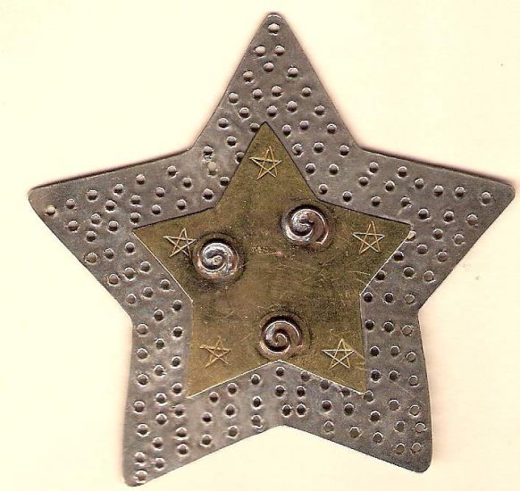 Large pewter and brass star for embellishing almost anything