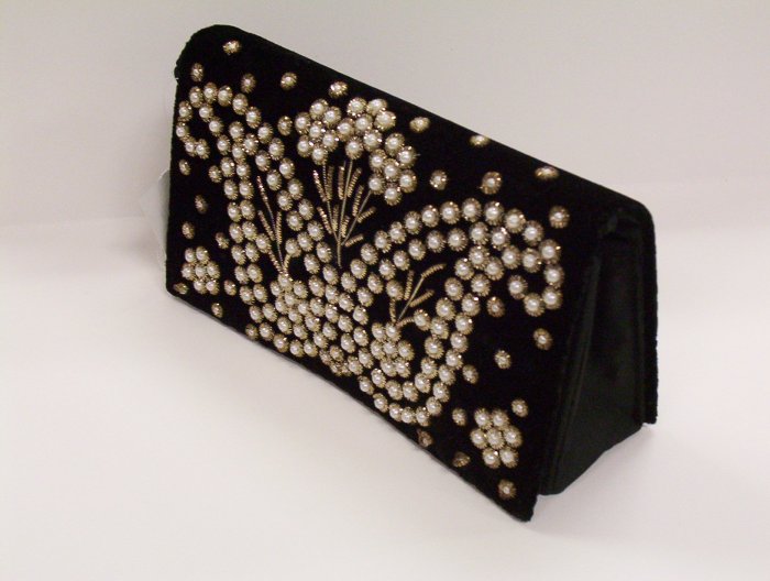 Black purse with bean floral