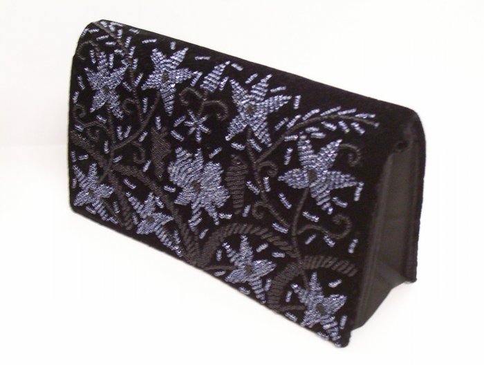 Black purse with purple flowers pattern