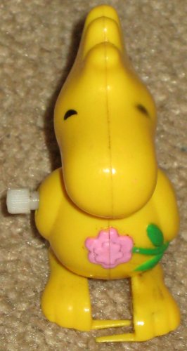 SOLD 3 Inch Woodstock Wind Up Walker Toy with Flower Peanuts Gang 1972 Charles Schulz