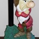 disney grumpy go away statue