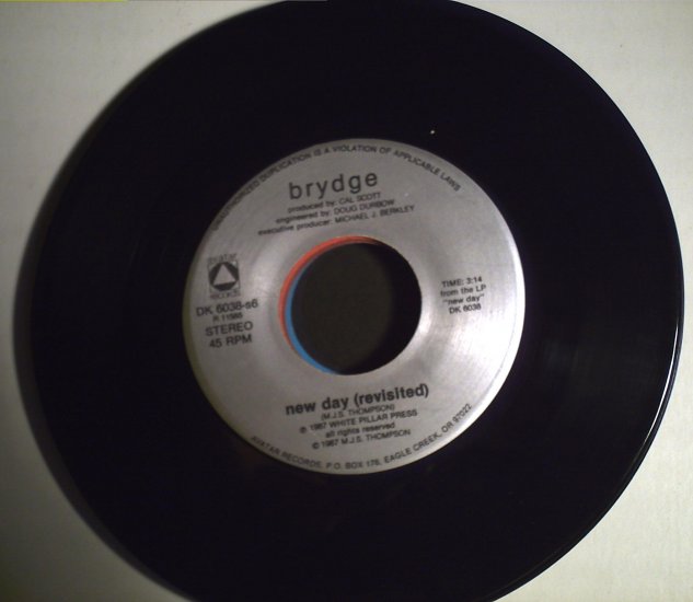 Brydge New day (revisited)/single copy.........1987