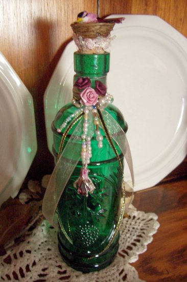 Altered, Jeweled Bottle with Tiny Bird on Nest
