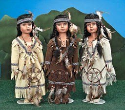16" PORCELAIN INDIAN DOLL W/7" METAL STAND.
