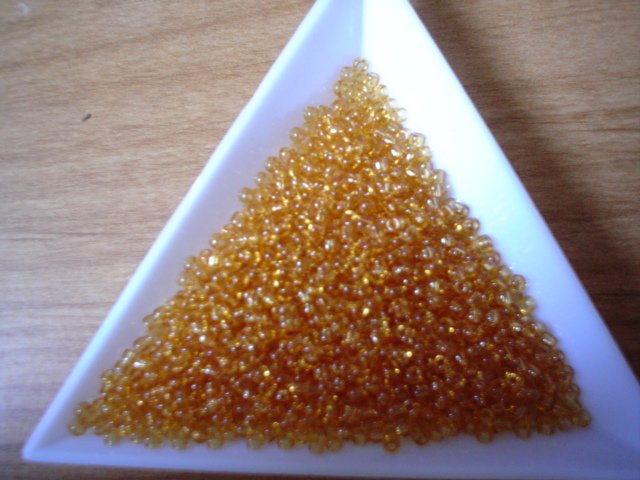 Size 11 Matsuno seed beads transparent amber 15 grams