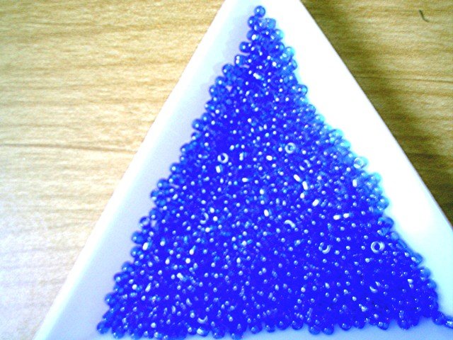 Size 11 Matsuno seed beads transparent dark blue 15 grams