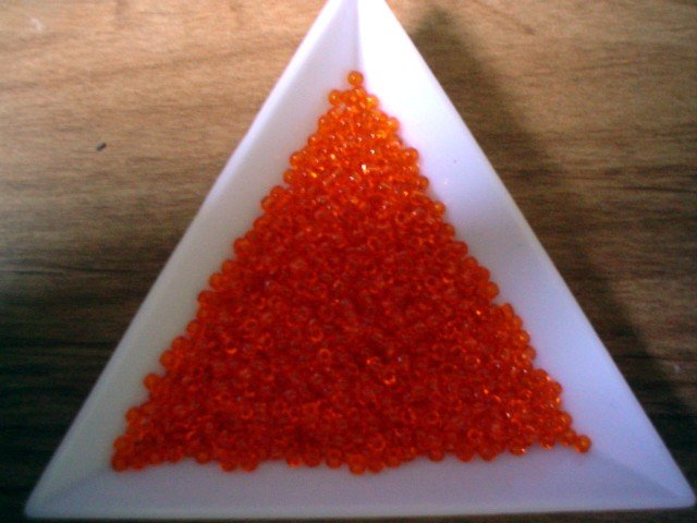Size 11 Matsuno seed beads transparent orange15 grams