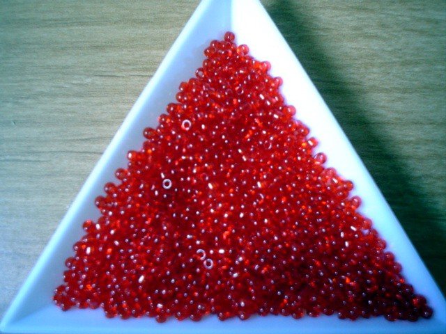 Size 11 Matsuno seed beads transparent ruby 15 grams