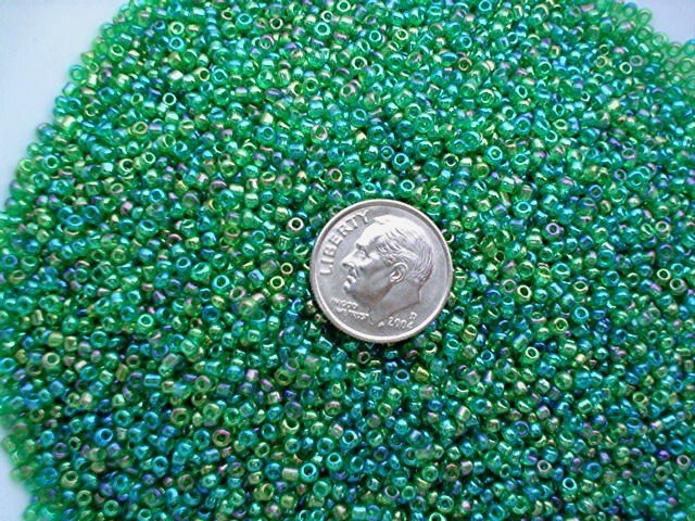 Size 11 Celestial rainbow beads green 15 grams