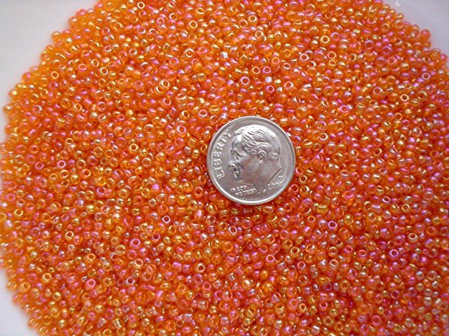 Size 11 Celestial rainbow beads orange15 grams