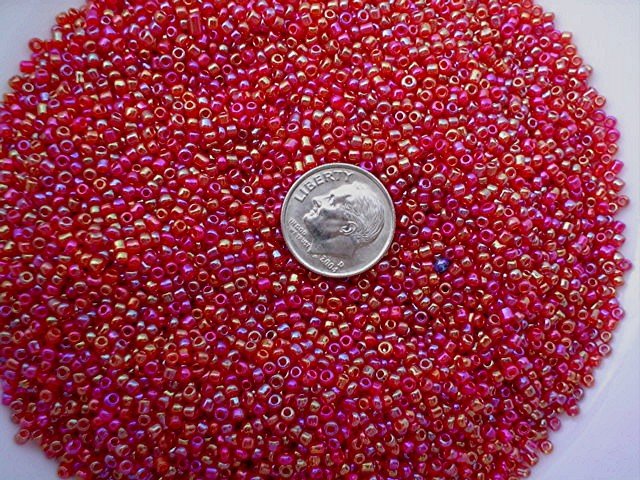 Size 11 Celestial rainbow beads ruby 15 grams
