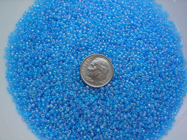 Size 11 Celestial rainbow beads teal15 grams