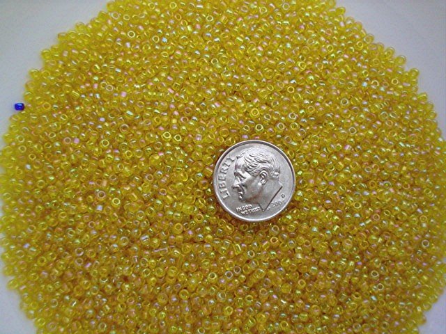 Size 11 Celestial rainbow beads yellow 15 grams