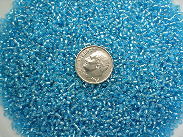 Size 11 Celestial silver lined beads teal 15 grams