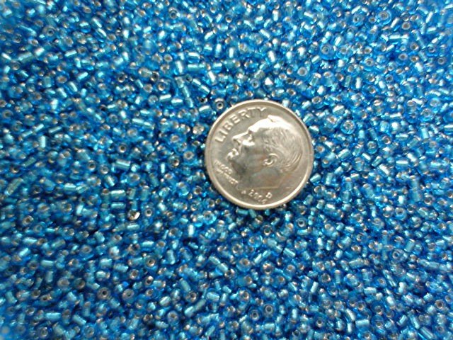 Size 11 Celestial silver lined beads turquoise 15 grams