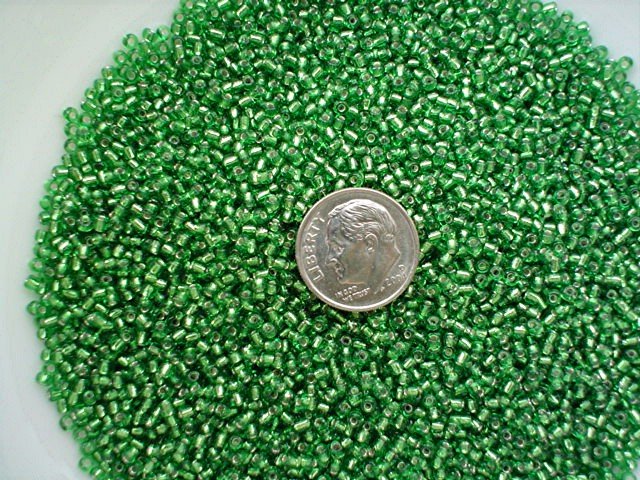 Size 11 Celestial silver lined beads green 15 grams