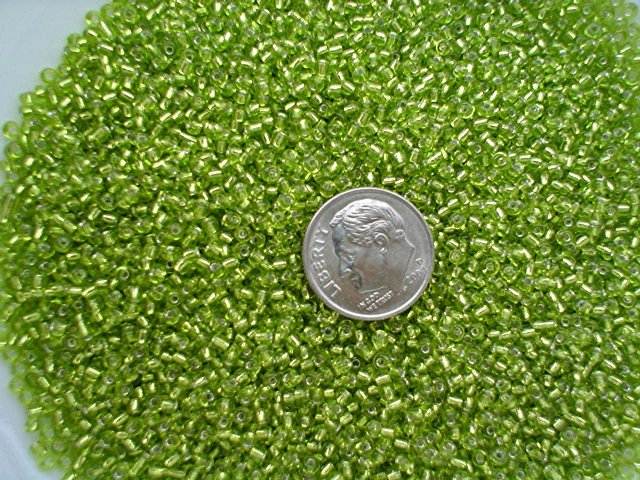 Size 11 Celestial silver lined beads lime 15 grams