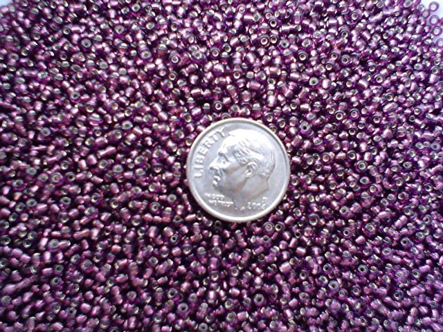 Size 11 Celestial silver lined beads purple 15 grams