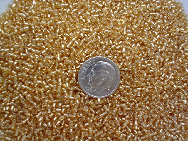 Size 11 Celestial silver lined beads tan 15 grams