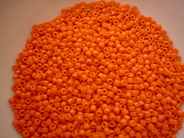Size 8 seed beads Opaque orange 15 grams