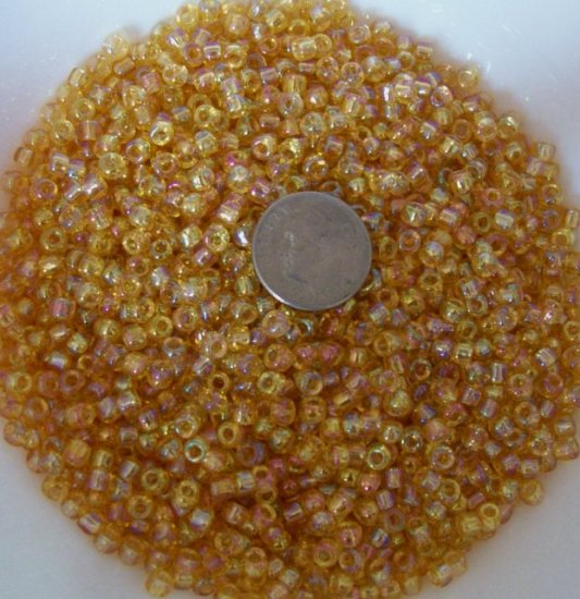 Size 6 seed beads Transparent Luster 25 Grams Amber