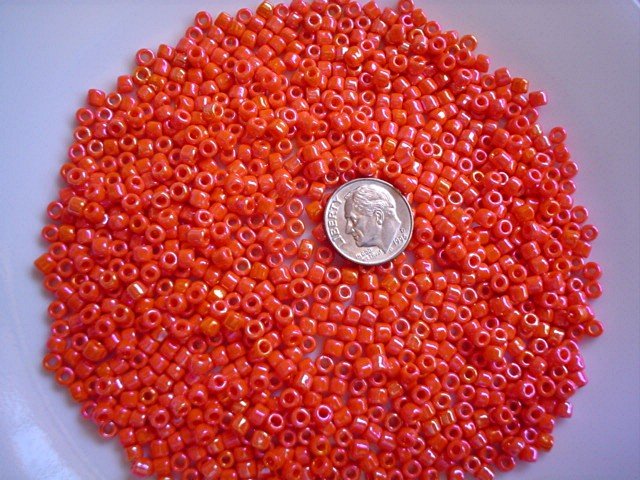 Size 6 seed beads Opaque Rainbow luster 25 grams Orange