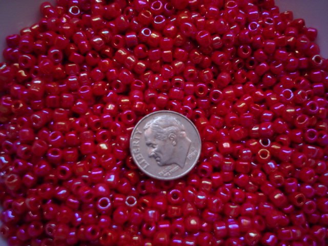 Size 6 seed beads Opaque Rainbow luster 25 grams Ruby