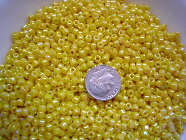 Size 6 seed beads Opaque Rainbow luster 25 grams Yellow