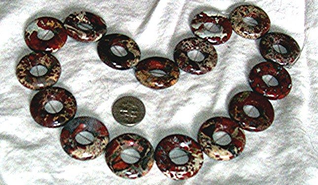 Gemstone stone beads Breciated jasper donut. 25mm 16 inch strand