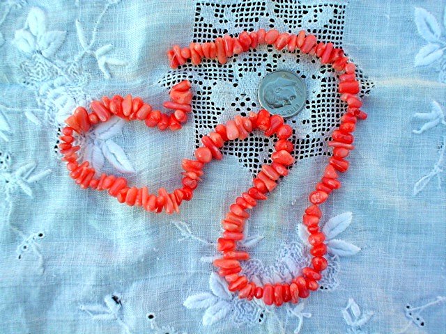 Pink coral cuppolini beads 16 inch strand.